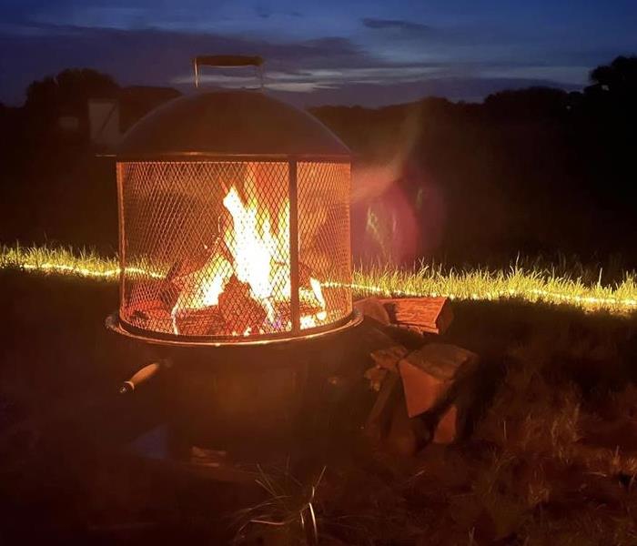 Picture of a fire burning in a firepit.
